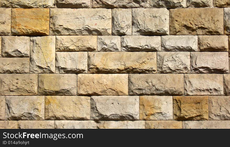 Beautifully shaded stones of a recently renovated old castle wall, natural colors. Beautifully shaded stones of a recently renovated old castle wall, natural colors.