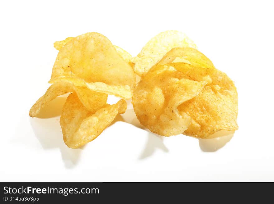 Crunchy potato chips composition isolated. Crunchy potato chips composition isolated