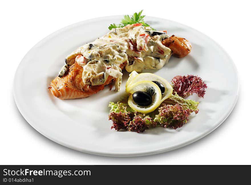 Salmon Steak Plate under Vegetable with Cream. Isolated on White Background. Salmon Steak Plate under Vegetable with Cream. Isolated on White Background