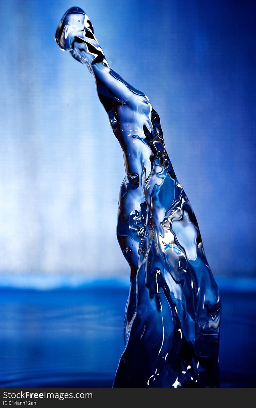 Water drop with blue background and blue surroundings. Water drop with blue background and blue surroundings