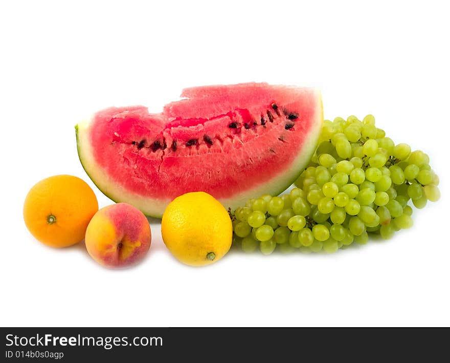 Tasty and useful fruit on a white background