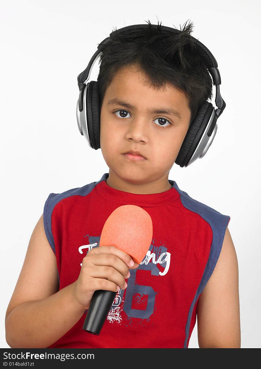 Asian boy with headphones mike