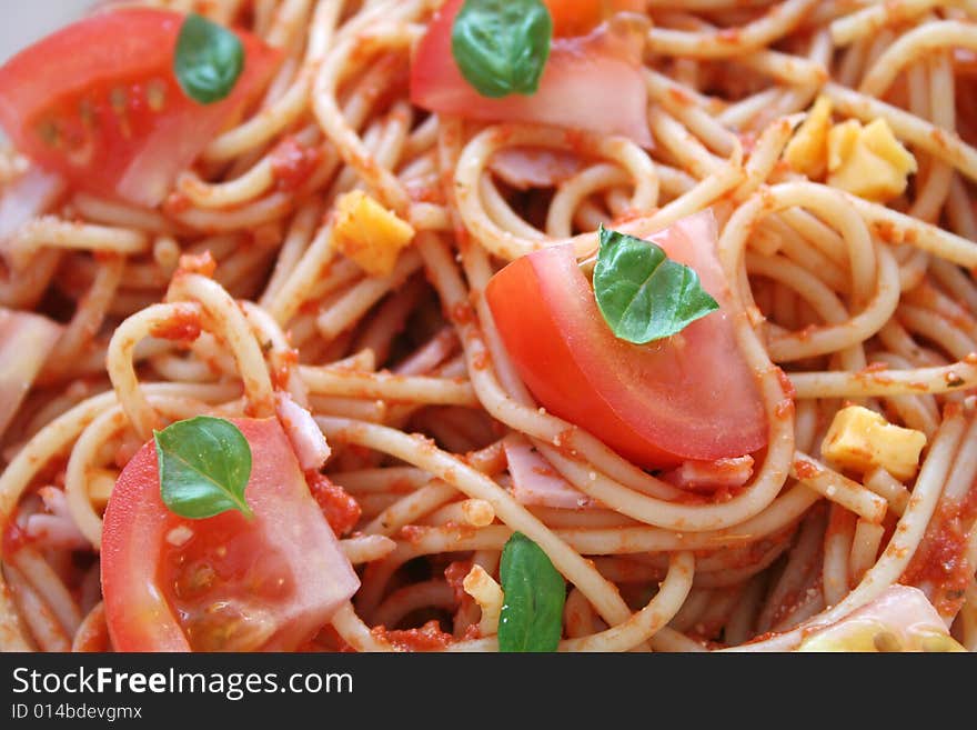 Italian pasta with fresh tomatoes, cheese and spices