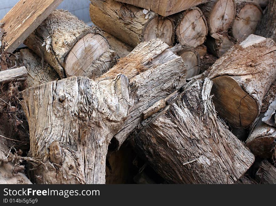 Details of a pile of chopped logs.