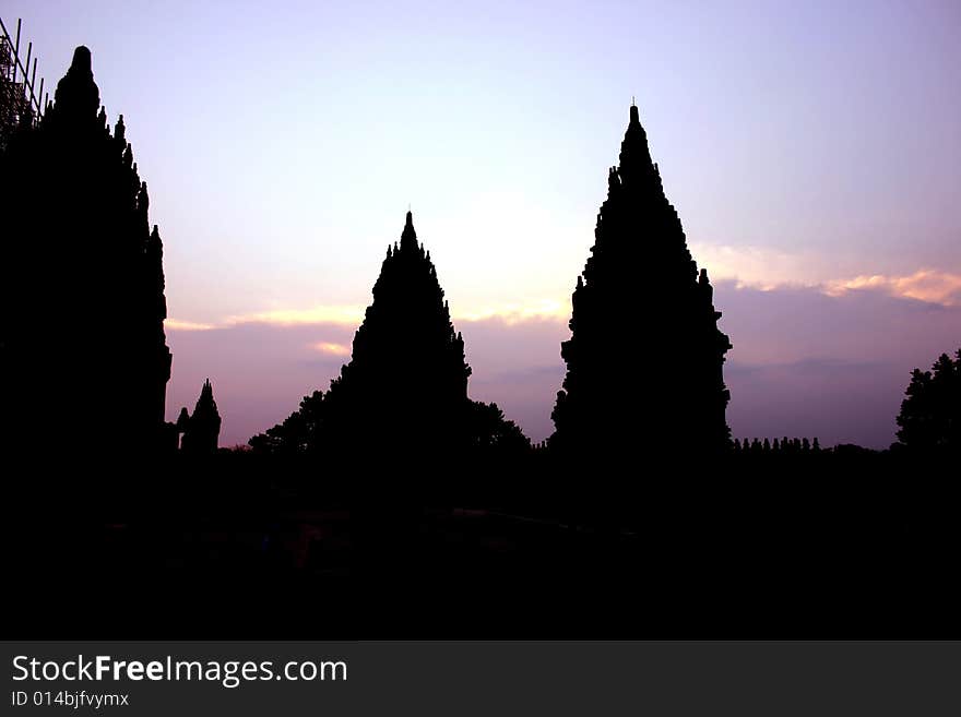 Silhouette of Hindu temles against a purple sky. Silhouette of Hindu temles against a purple sky.