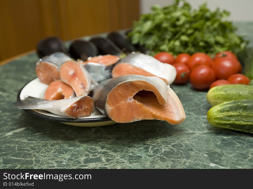 Fresh red salmon fish with vegetable cucumber and tomato