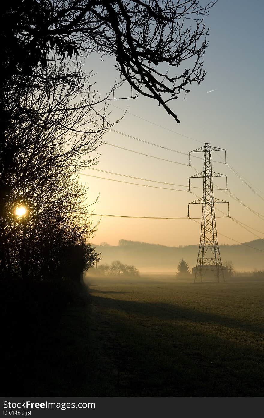 Sunrise over pylon field