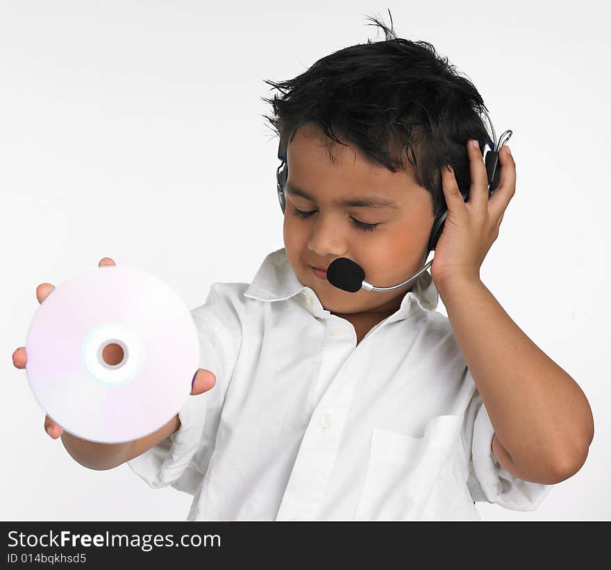 Boy holding cd with headphone