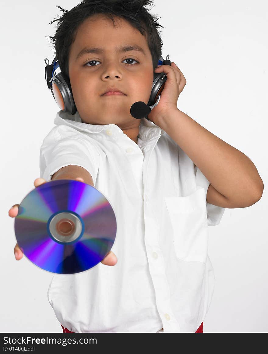 Asian boy holding cd with headphone