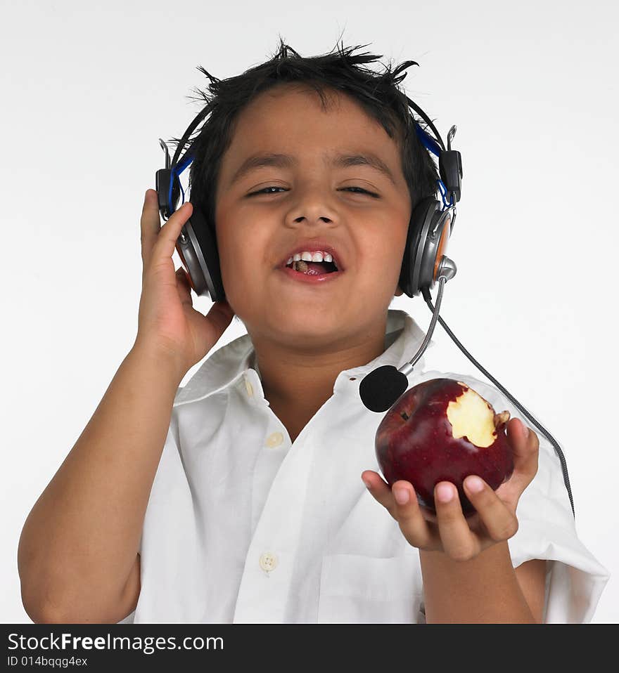 Boy Biting A Red Apple