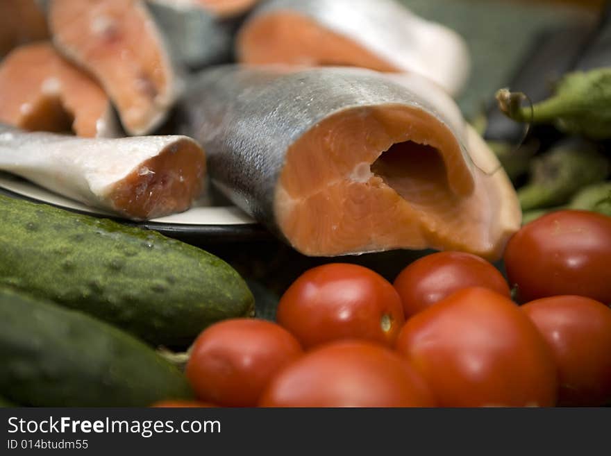 Fresh red salmon fish with vegetable cucumber and tomato