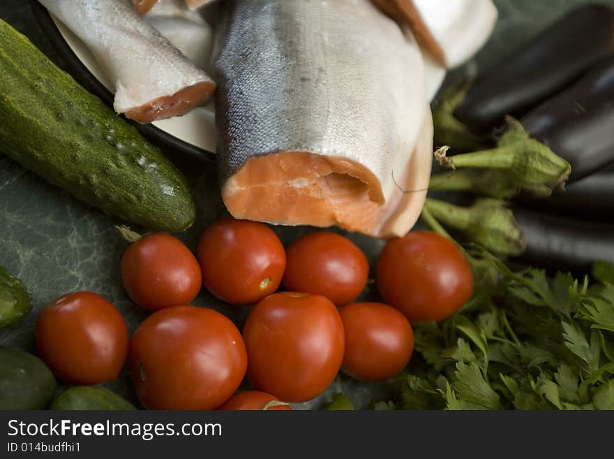 Fresh red salmon fish with vegetable cucumber and tomato