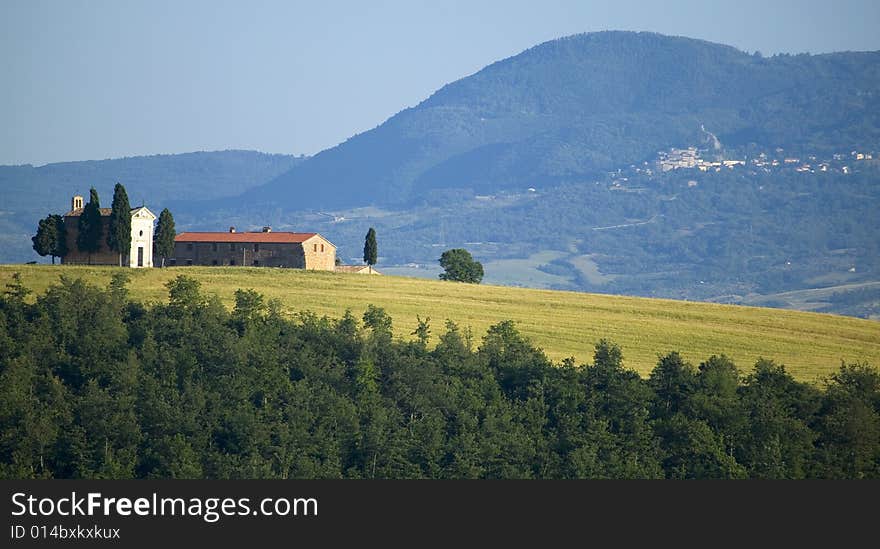 Tuscan countryside with distant farms. Tuscan countryside with distant farms