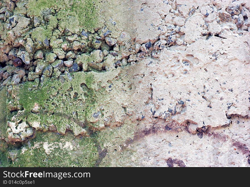 Concrete wall with cracked gray paint worn by weather. Concrete wall with cracked gray paint worn by weather.