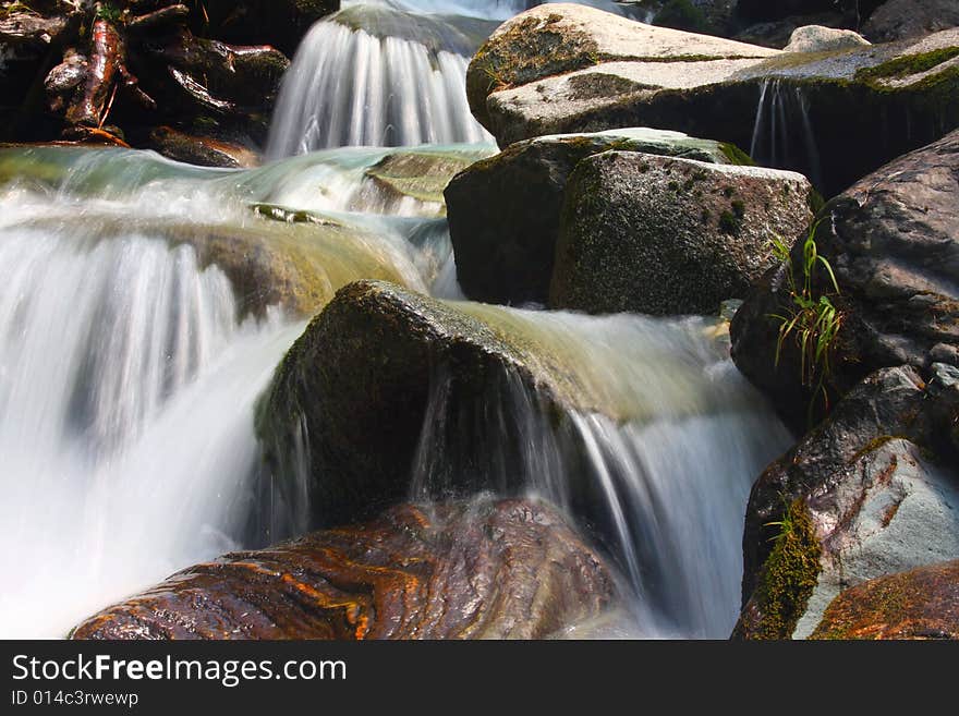 Long exposure shot of a small waterfall. Long exposure shot of a small waterfall