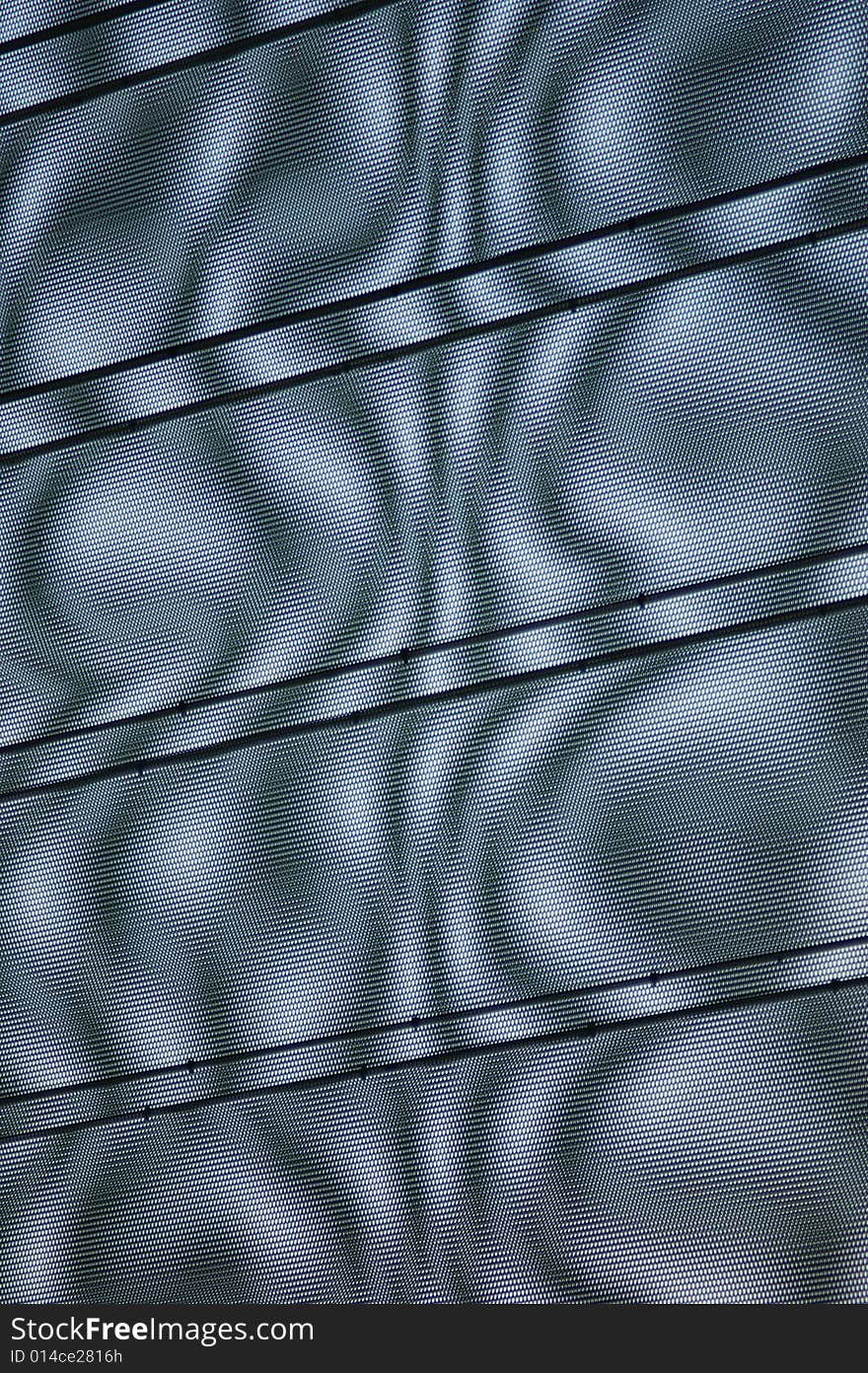 Light playing in a grid covering