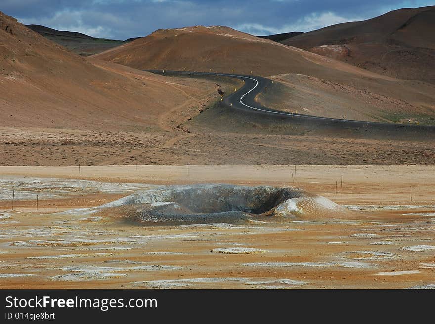 Highway leaving from a volcanic crater in Iceland