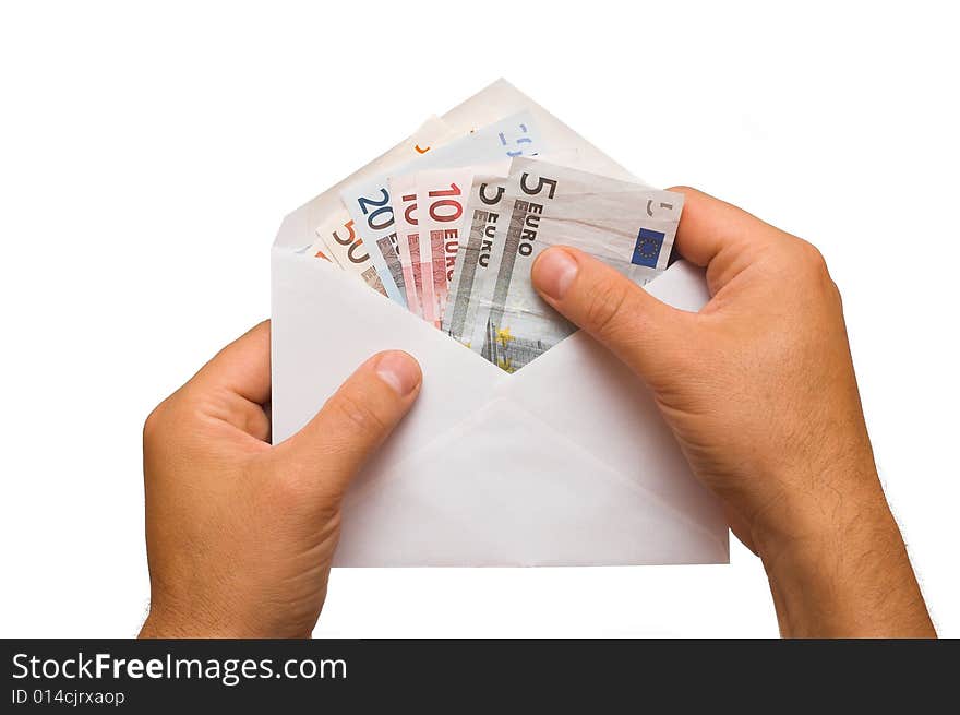 Human hands is counting money in an envelope on white. Human hands is counting money in an envelope on white