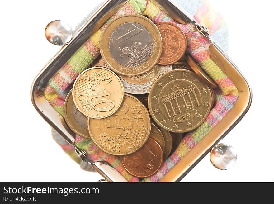 Purse with coins on white