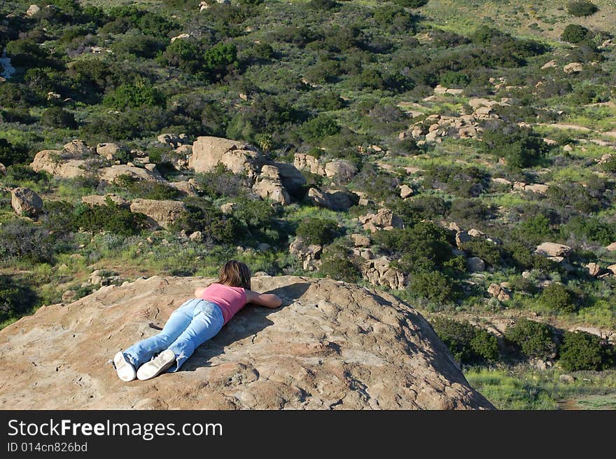 Young girl overlooking canyon