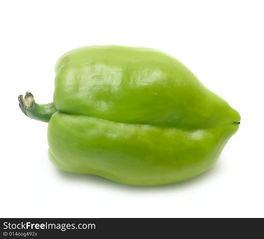 One green pepper isolated on white