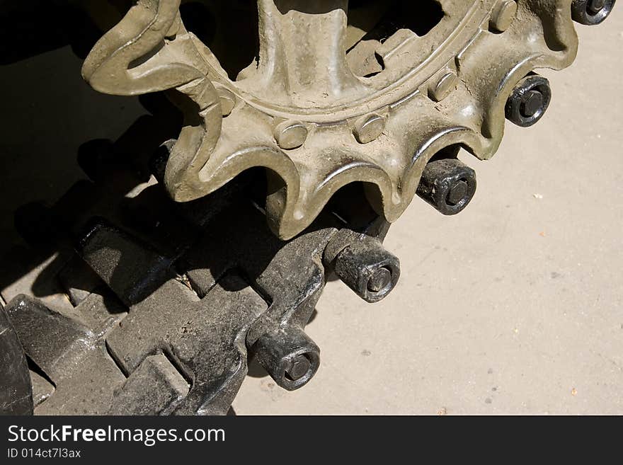 A closeup of tracks of an old military vehicle. A closeup of tracks of an old military vehicle