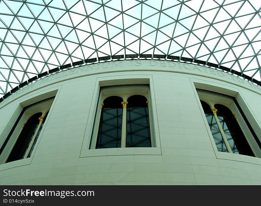 Stone wall with windows with a glass ceiling. Stone wall with windows with a glass ceiling