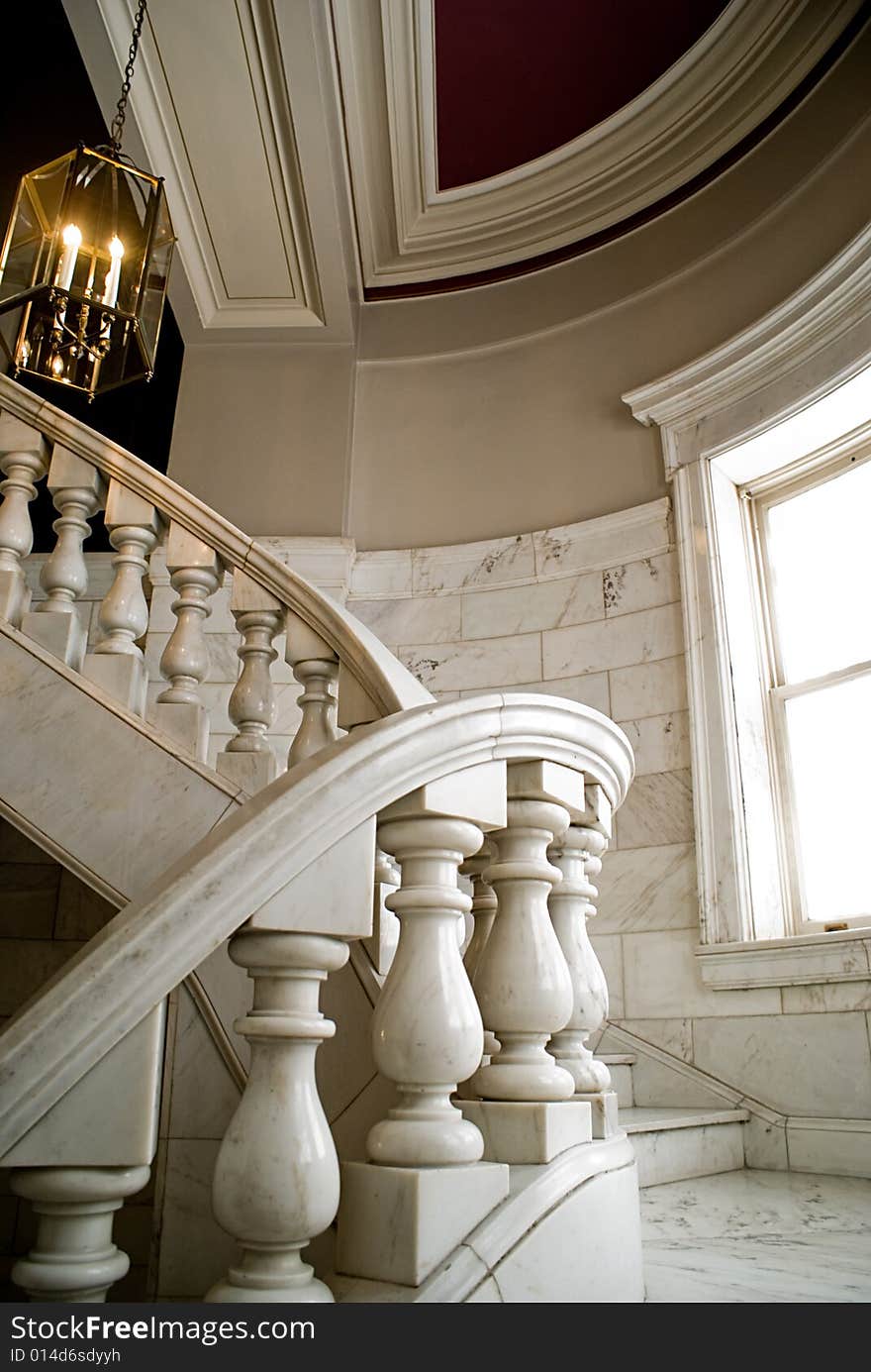 A beautiful stair case in a classic building. A beautiful stair case in a classic building.