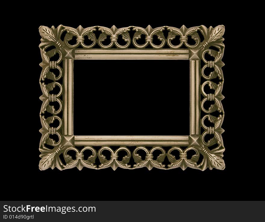 Empty antique frame with intricate pattern isolated on black. Empty antique frame with intricate pattern isolated on black