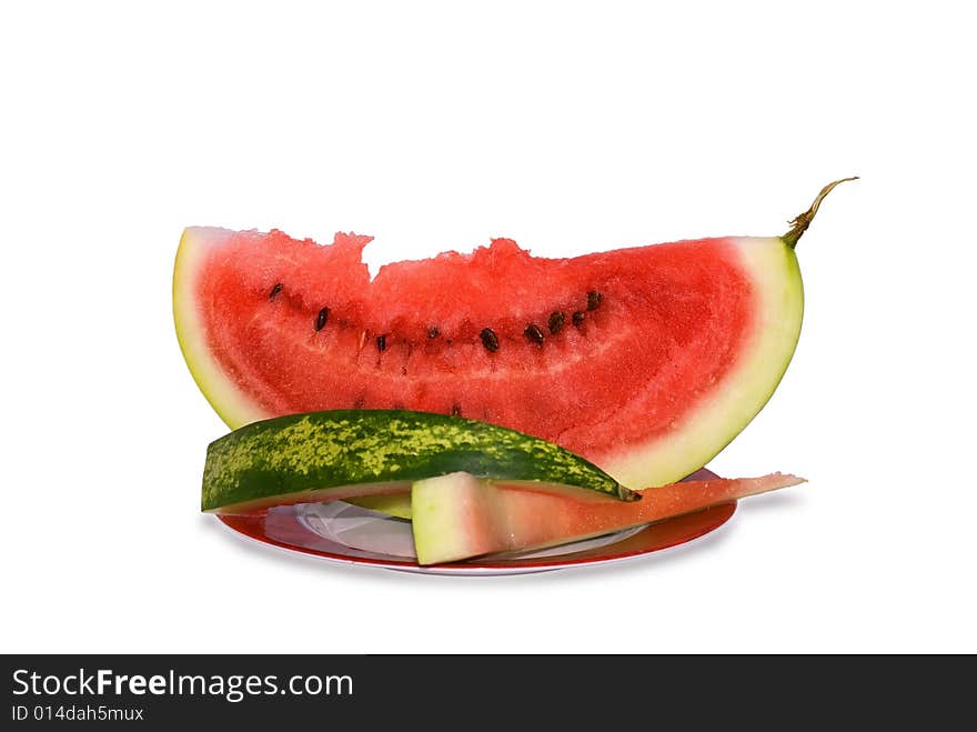 Water-melon and crusts on a plate isolated on a white background