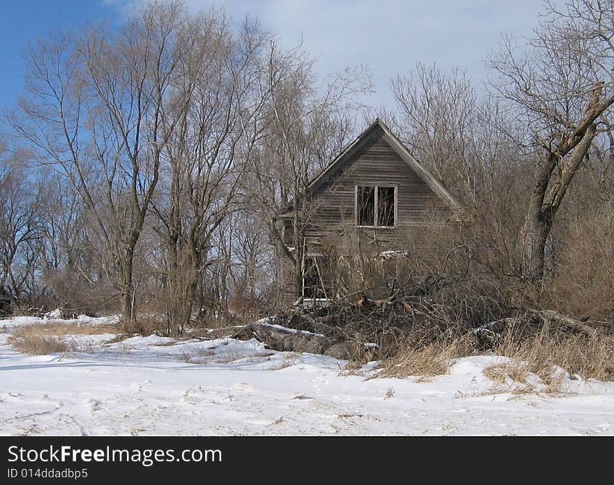 Deserted farm house in winter in southwest Minnesota.