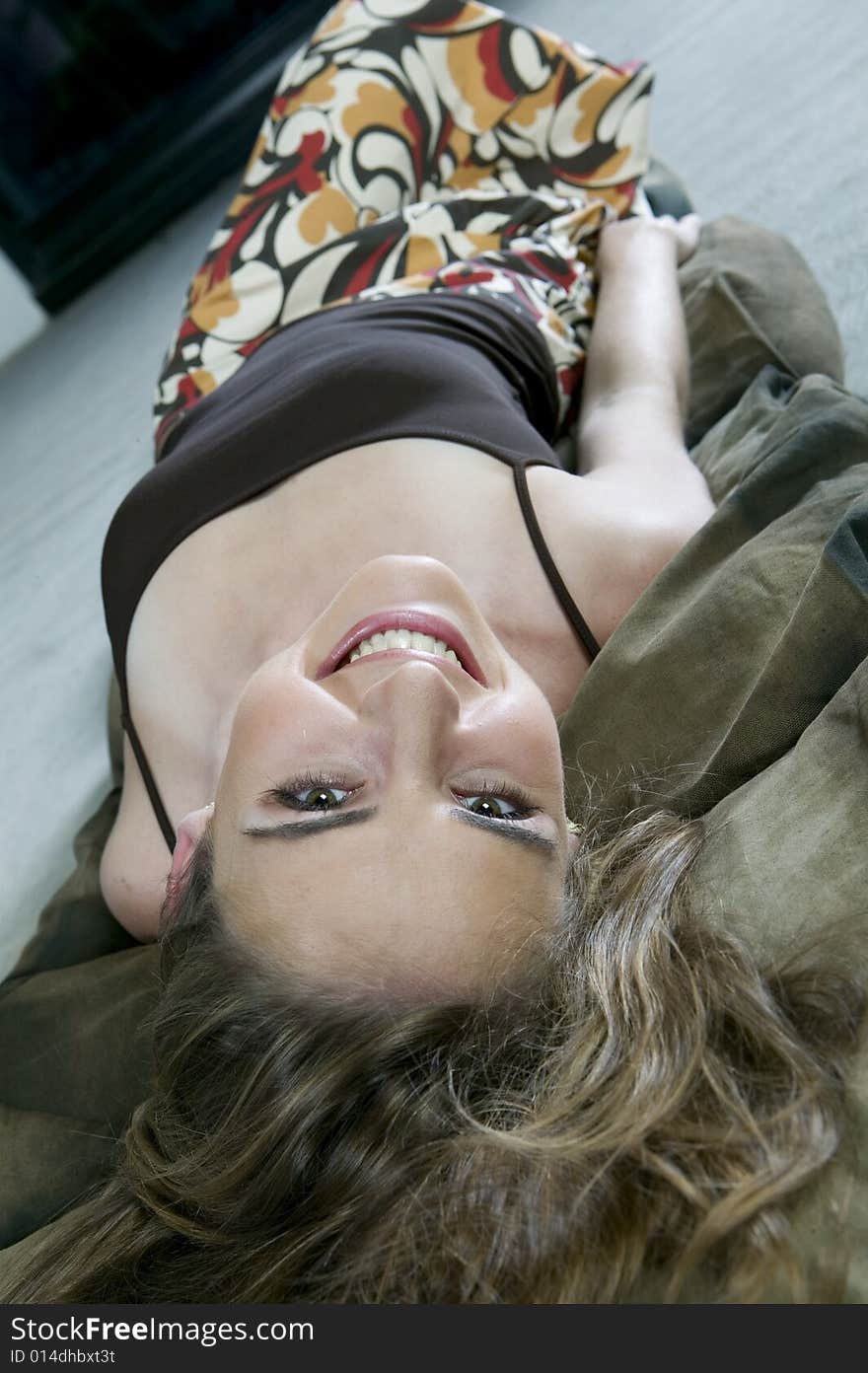 YOung Blonde Woman Lying On The Floor