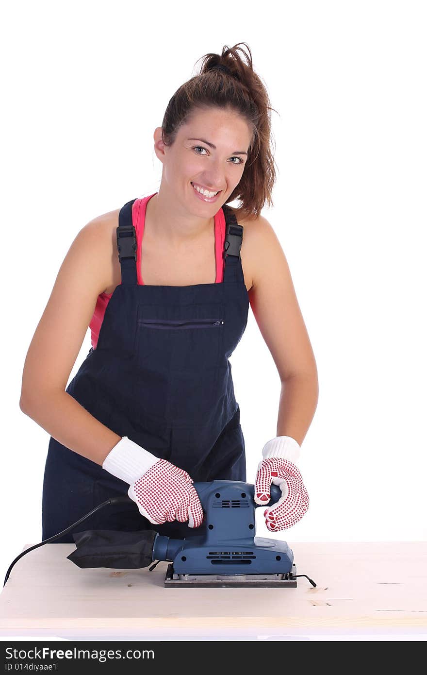 Woman carpenter at work on white background