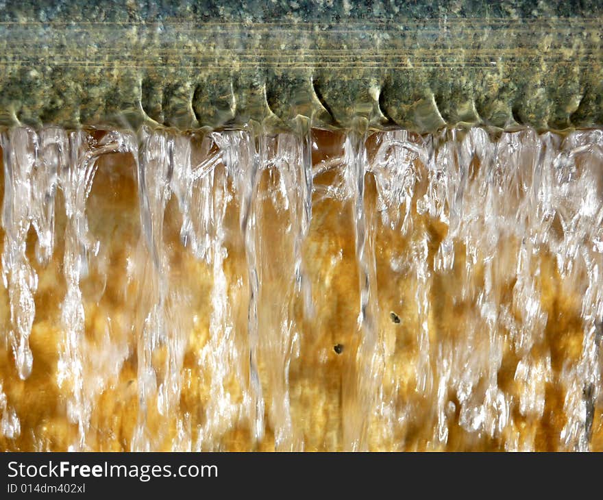 A abstract photograph of some falling water. A abstract photograph of some falling water.