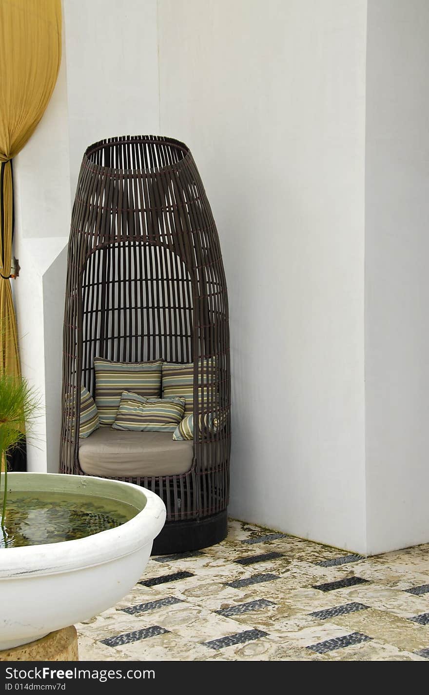 Comfortable Wicker Chair with Soft Pillows. Comfortable Wicker Chair with Soft Pillows