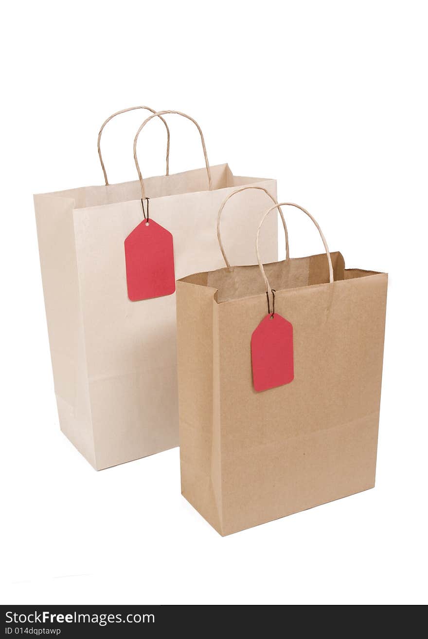 Two Shopping Bags With Red Tag