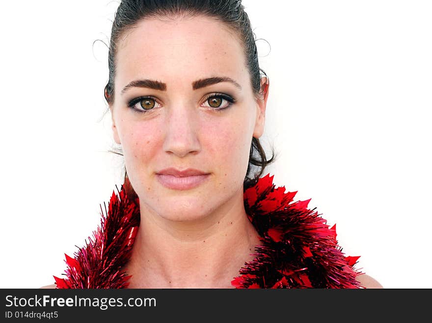 Isolated Christmas portrait of a happy woman with a gift.