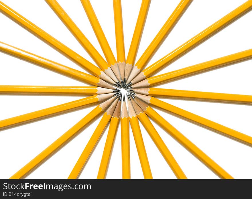 Vibrant Ring of Yellow Pencils arranged in a circle pattern like the spokes of a tire