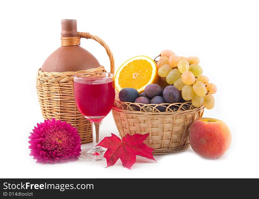 Bottle fault in a yellow basket and aster on a white background