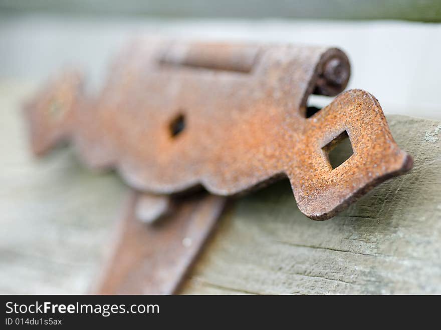 Rusty brown lock of wooden chest. Rusty brown lock of wooden chest