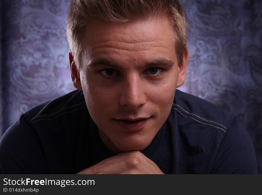 Portrait of a young handsome man in studio. Portrait of a young handsome man in studio