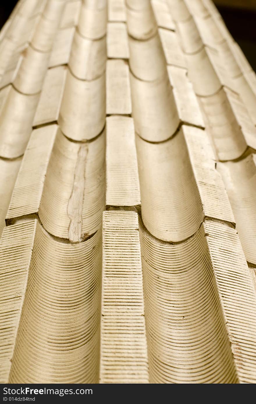 Patterned design of roof on a cloudy day. Patterned design of roof on a cloudy day.