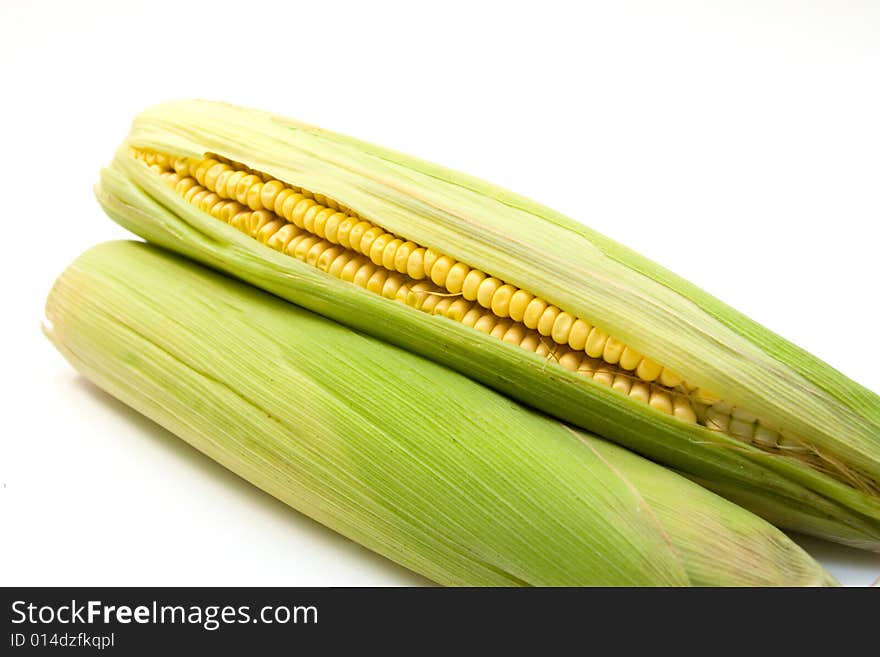 Two corns isolated on white background