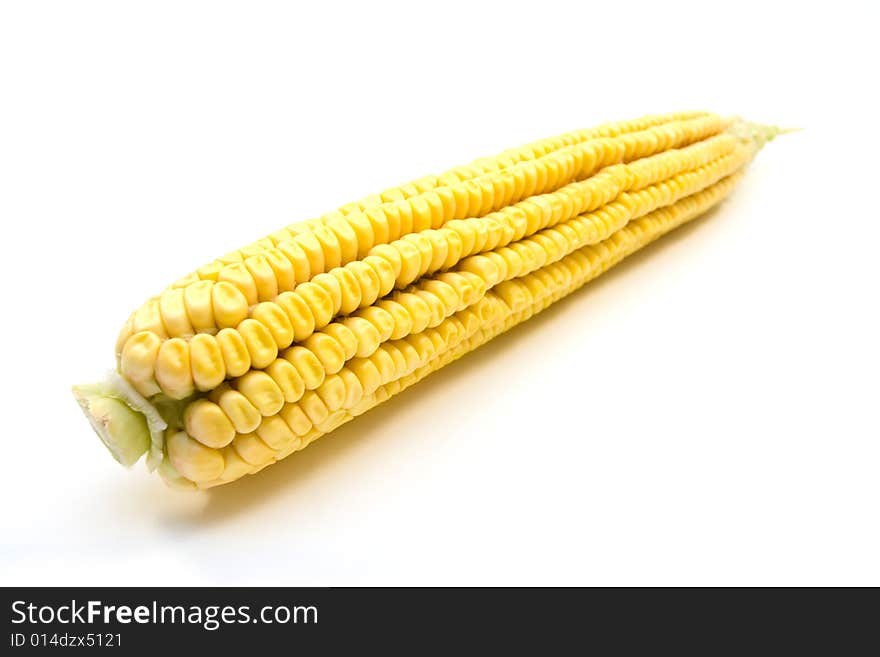 Fresh yellow corn on white