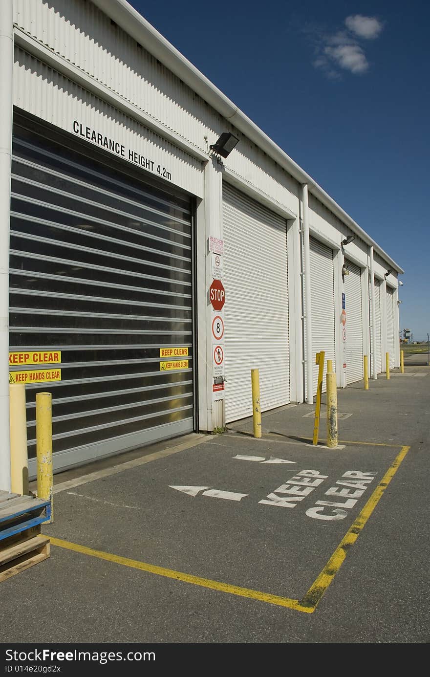 Keep Clear Sign out front of Industrial Buildings