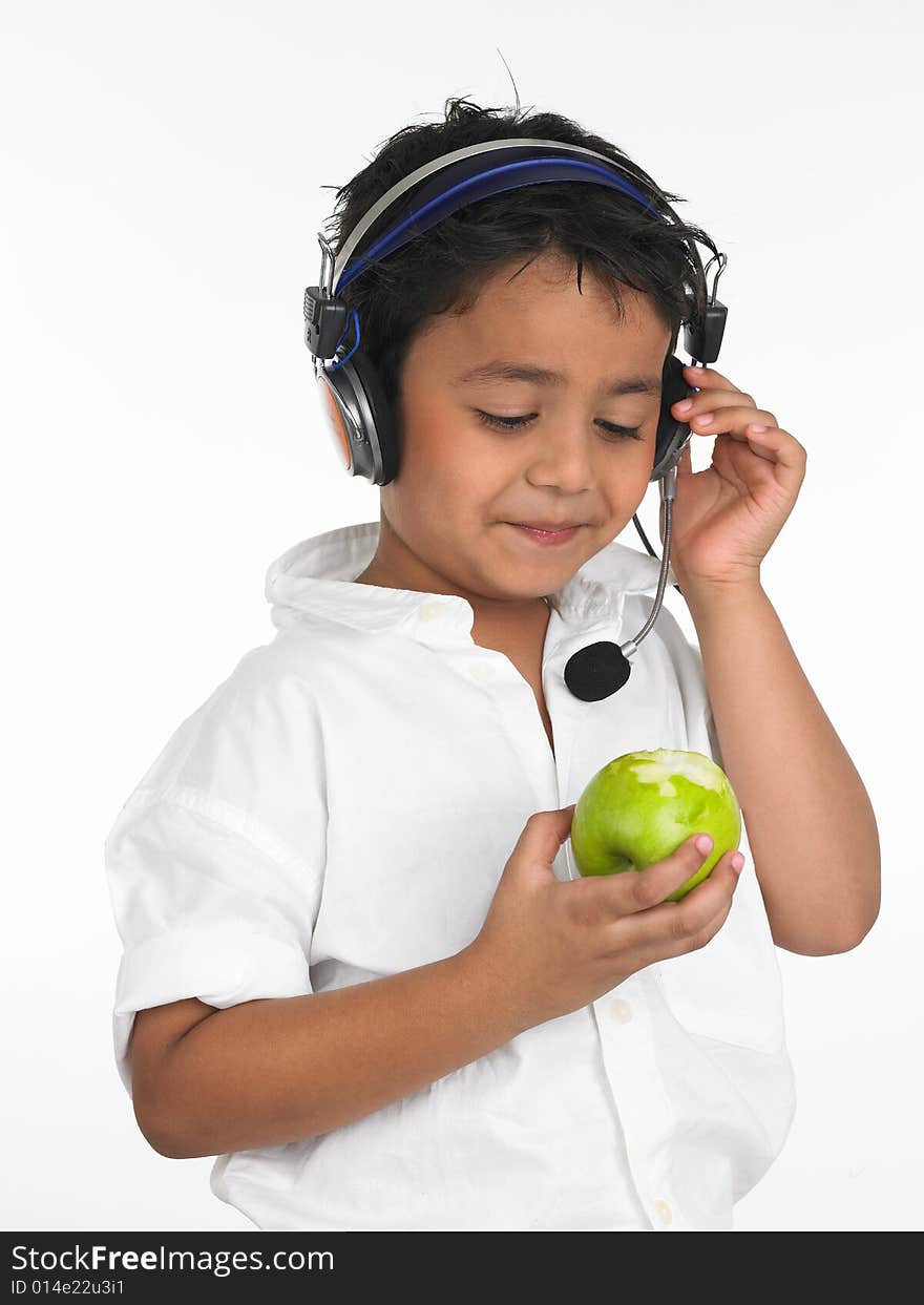 Boy Biting Into A Green Apple