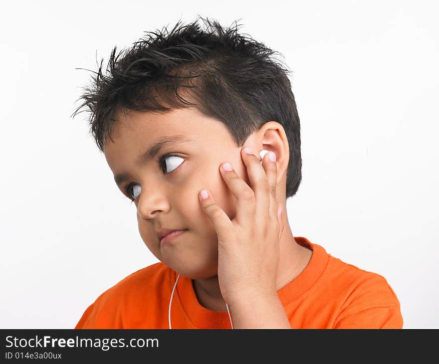 Asian boy chilling out listening to music