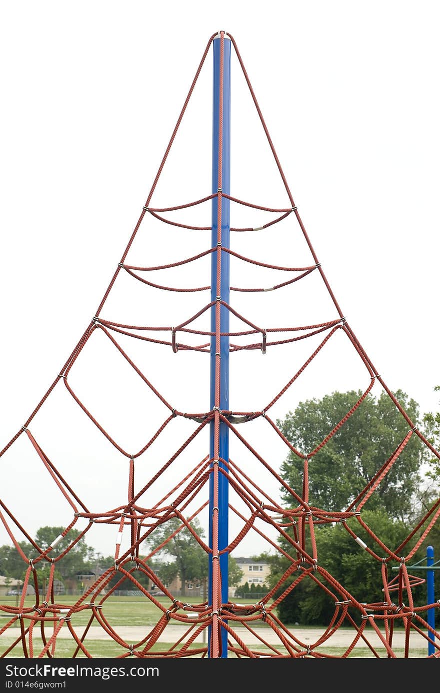 Red climbing rope on playground. Red climbing rope on playground