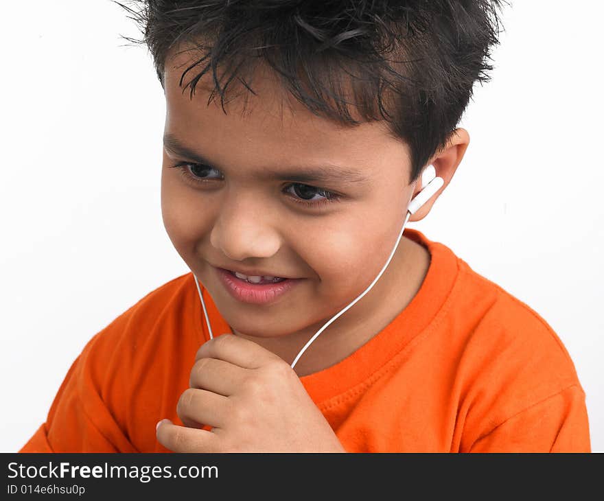 Asian Boy Listening To Music