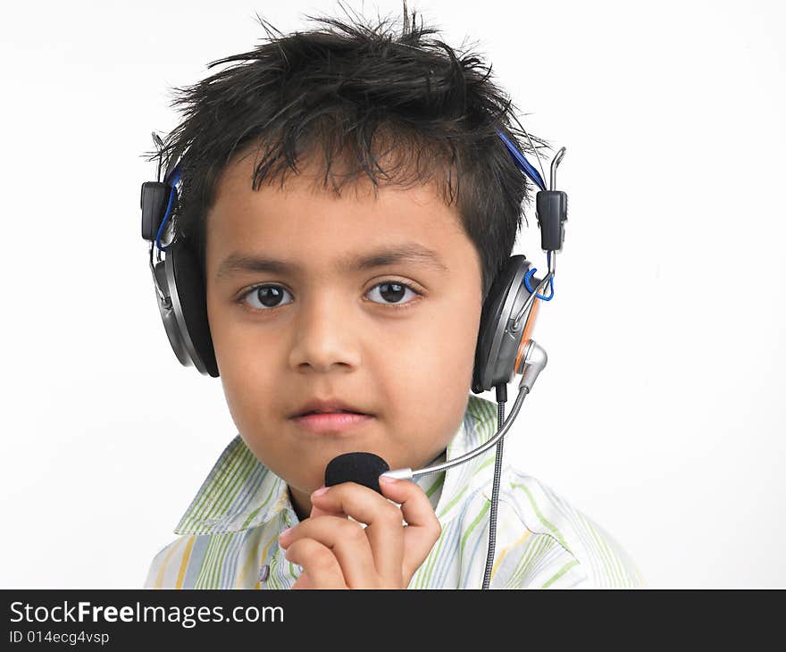 Asian boy with headphones techy looking. Asian boy with headphones techy looking